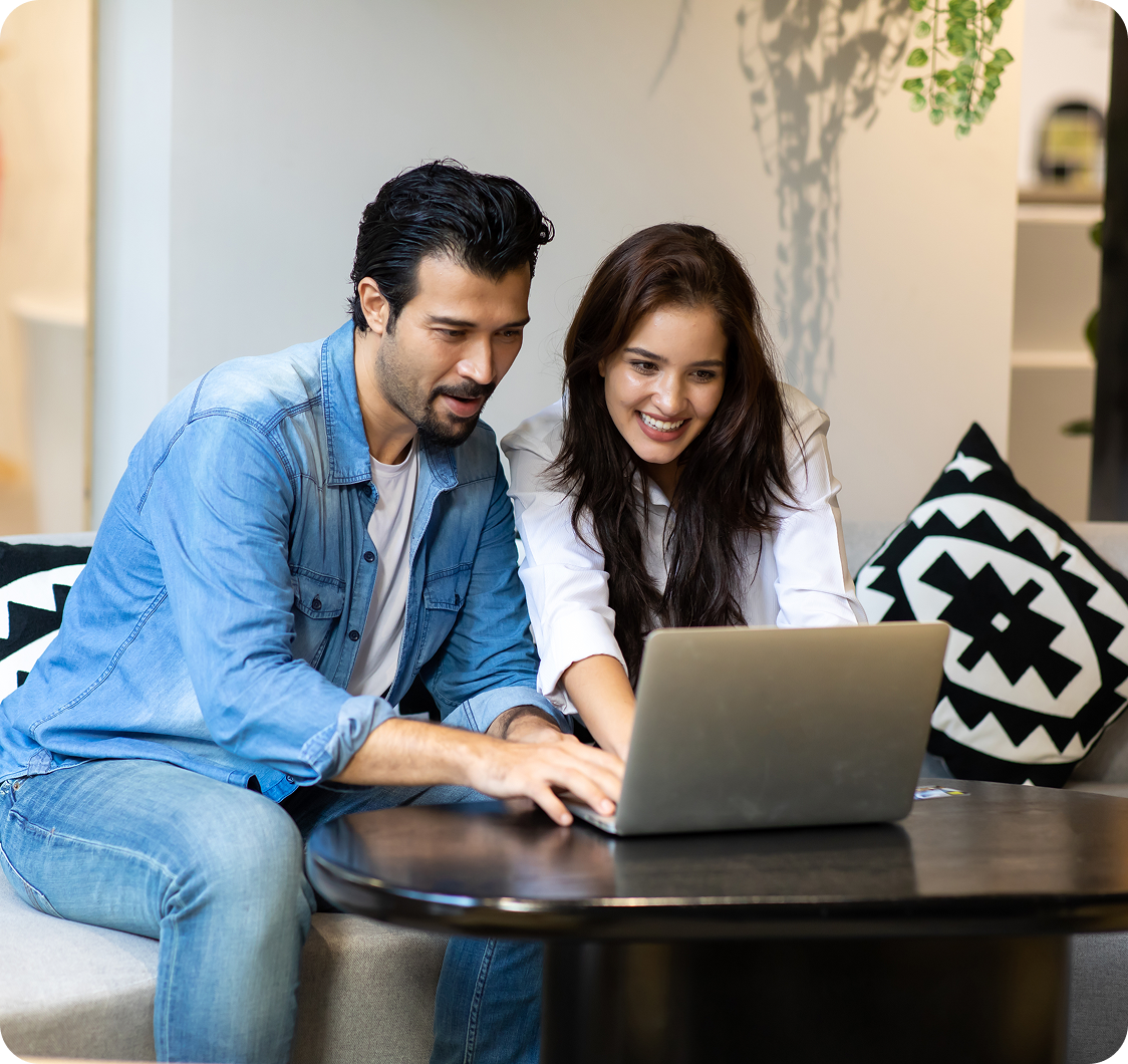 Happy couple finding financial solutions